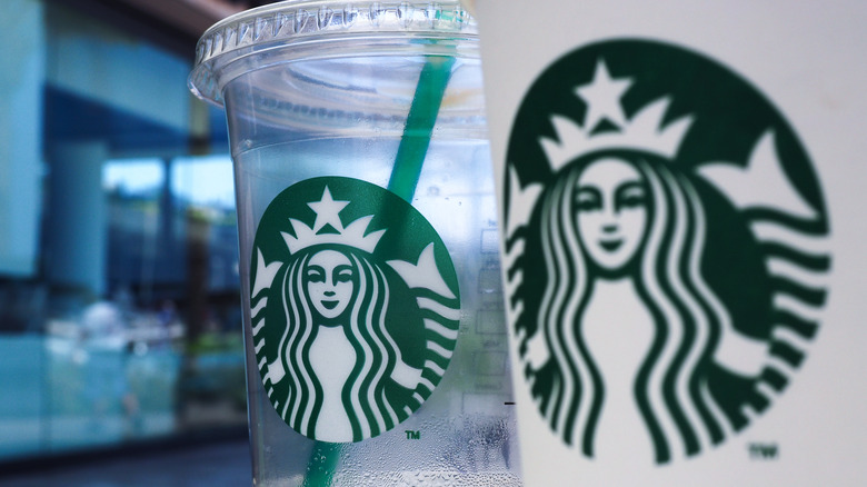 Two Starbucks cups next to each other