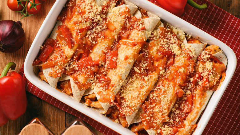 a tray of chicken enchiladas