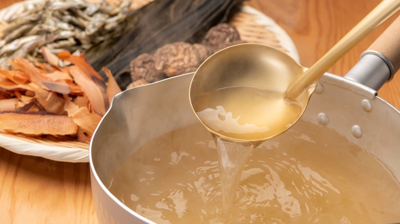 Ladling dashi in a pot