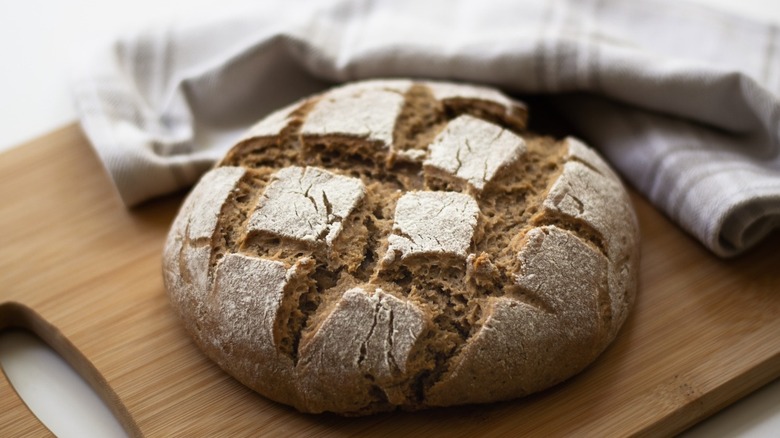 Baked bread with deep scores