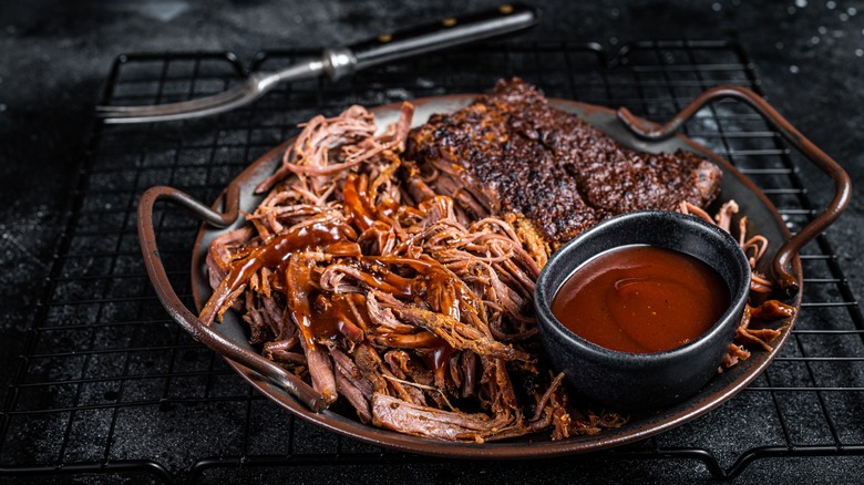 Barbecued meats with sauce on the side