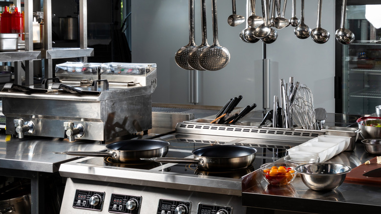 Various cookware in a commercial kitchen