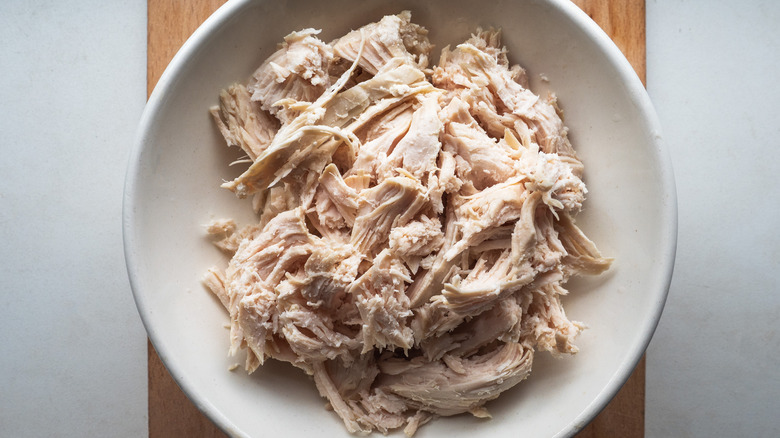 Bowl of shredded chicken breast