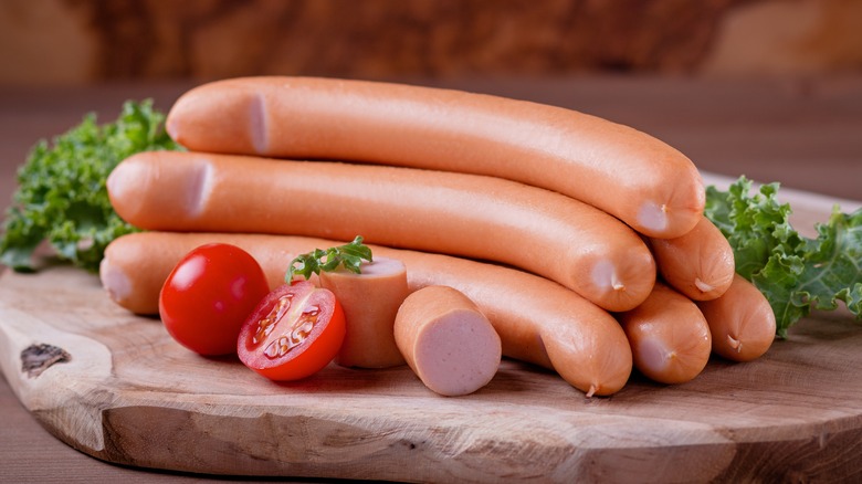 Hot dogs on a cutting board