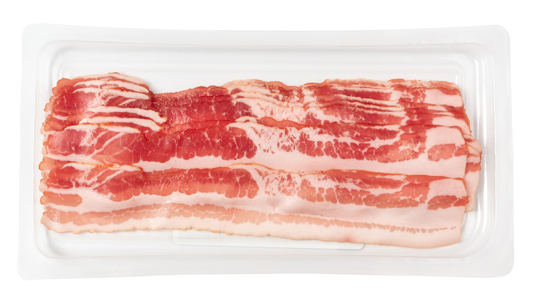 raw bacon slices in clear packaging
