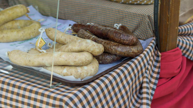 Butifarra sausages on gingham tablecloth