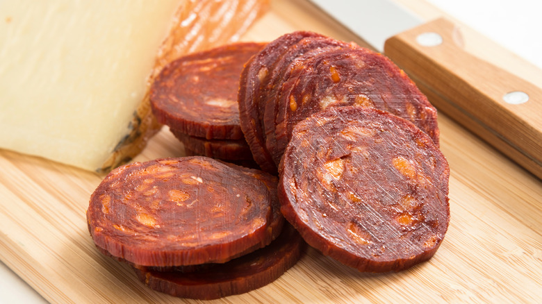 Chorizo slices and cheese wedge