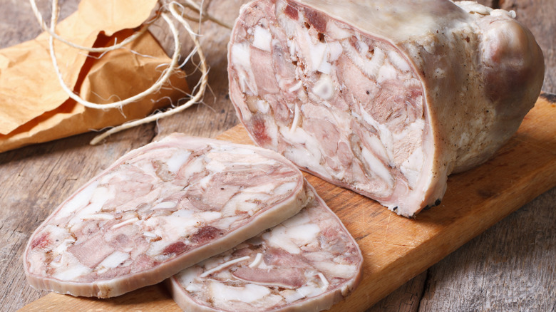 sliced guanciale on cutting board