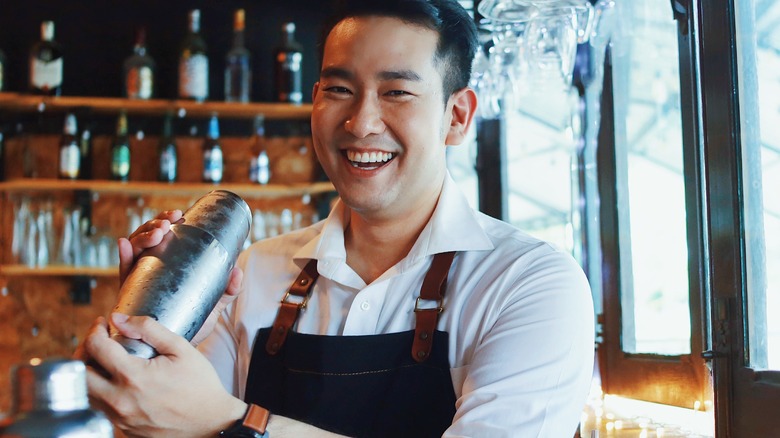 bartender mixing a cocktail