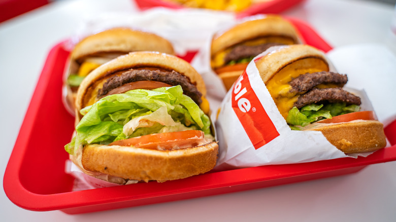 Various In-N-Out burgers in a red tray