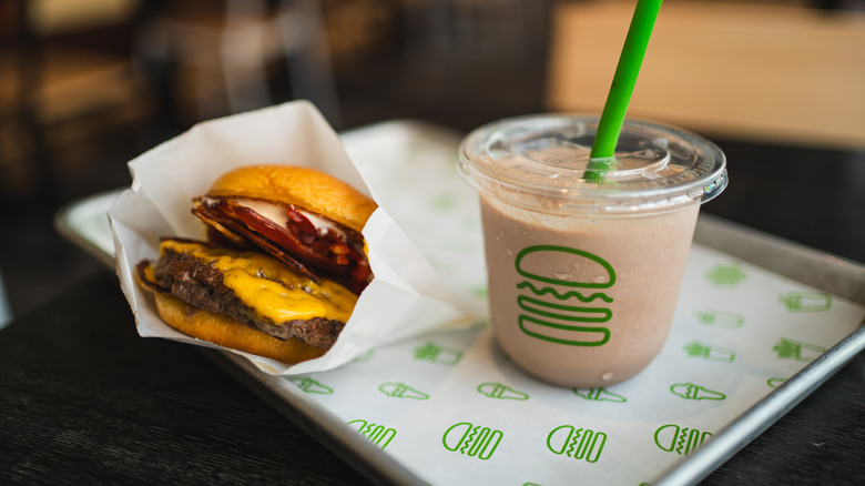 Shake Shack burger and milkshake on tray
