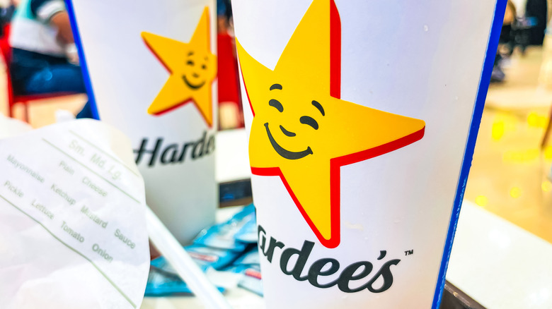 2 drink cups from Hardee's