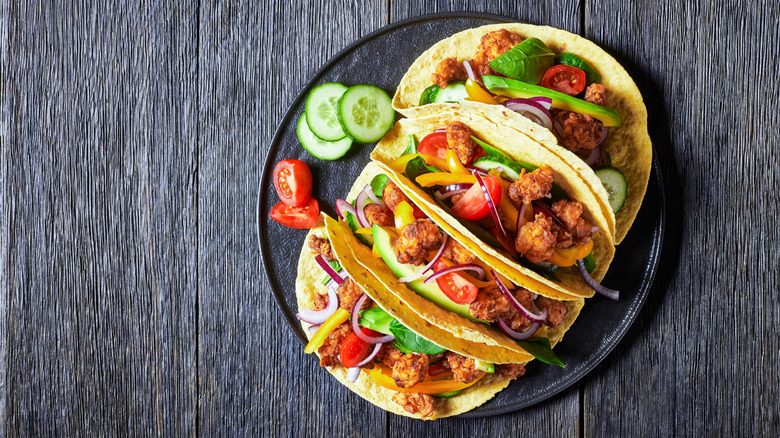Three chicken tacos.