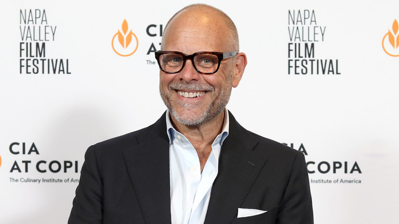 Alton Brown in front of Napa Valley Film Festival step and repeat