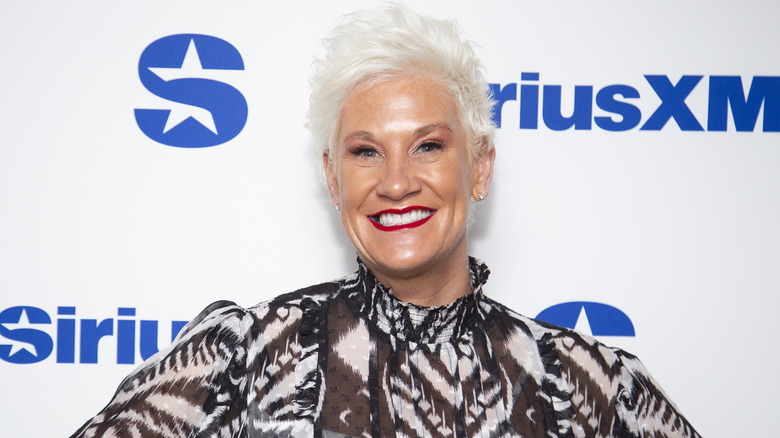Anne Burrell posed in front of SiriusXM step and repeat