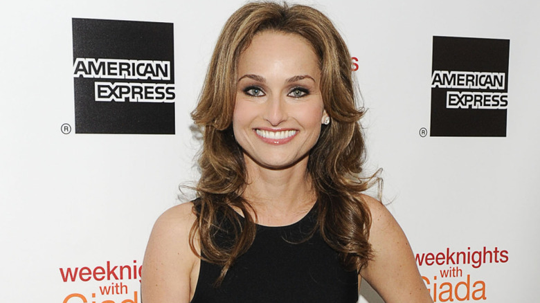 Giada DiLaurentiis in front of American Express and weeknights with Giada step and repeat