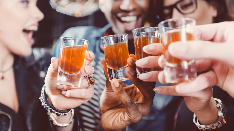 friends taking shots together