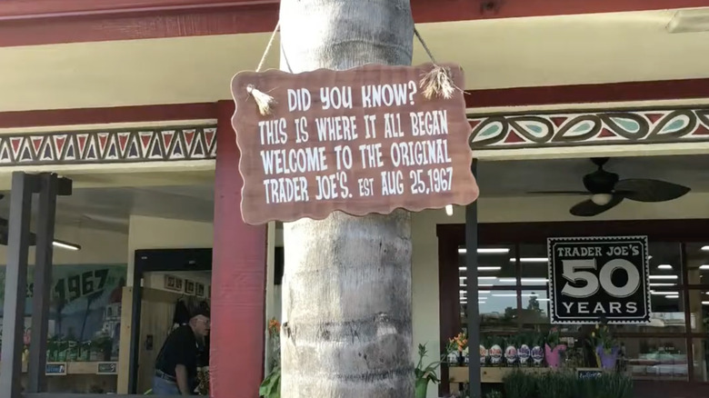 Sign on tree in front of original Trader Joe's