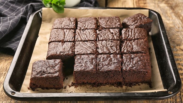 tray of chocolate cake cut into squares