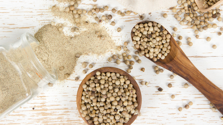 whole and ground white peppercorns