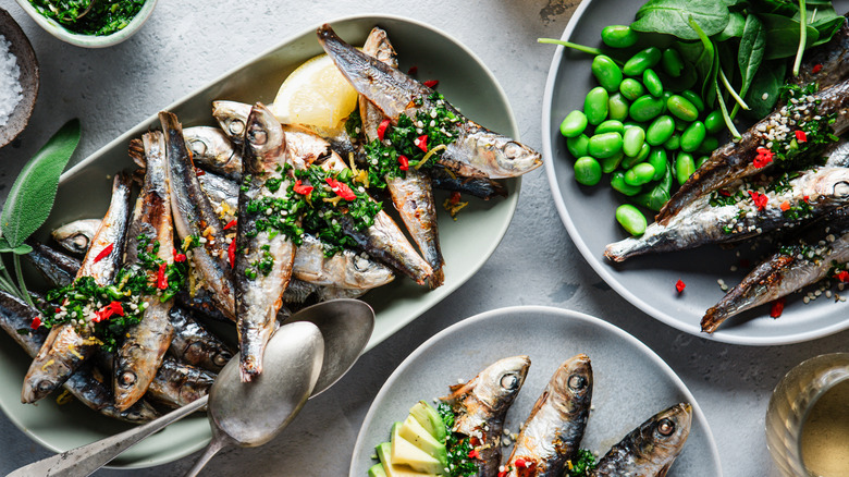 Sardines topped with chimichurri sauce.