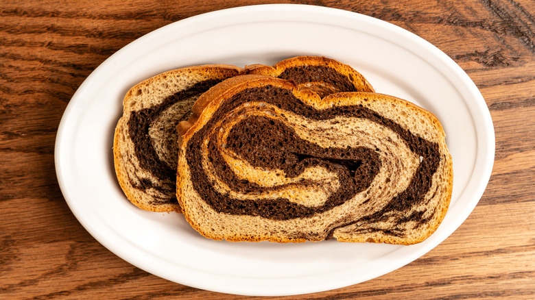 Slices of marbled rye toast on a plate