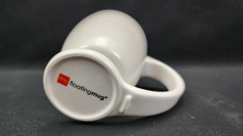 Floating Mug on its side showing logo on bottom