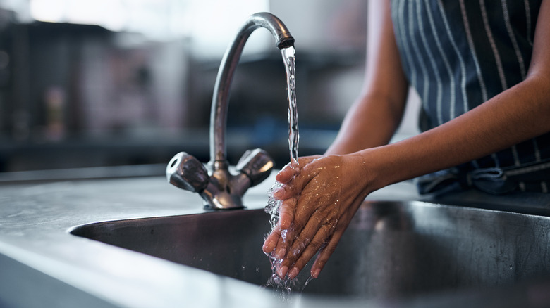 Person washing hands