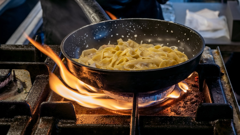 Gas stove cooking with pan