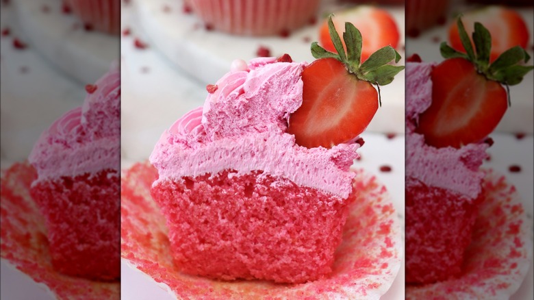 Moist strawberry cupcake cut in half