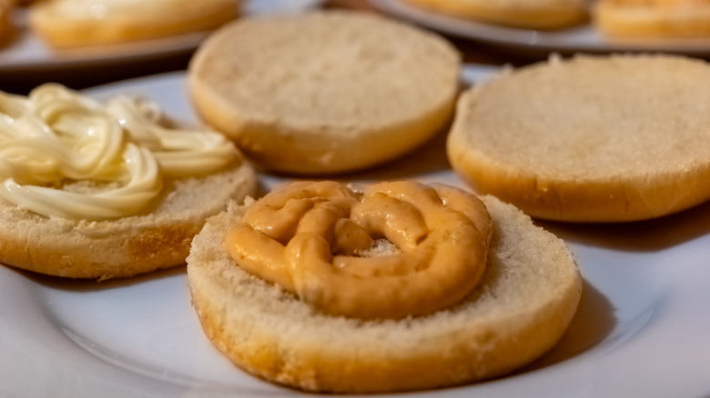 Peanut butter and mayo on burger buns
