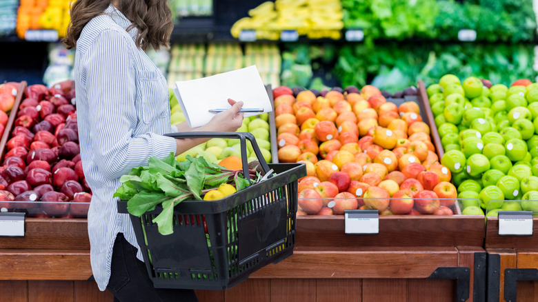 woman buying produce