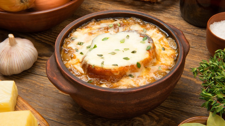 Bowl of French onion soup with melted cheese crouton