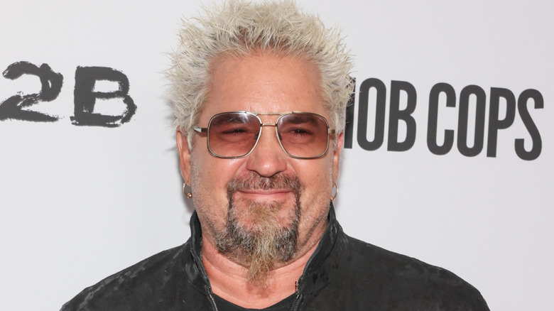 Closeup of Guy Fieri, smiling