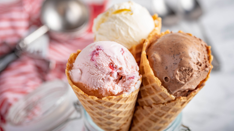 waffle cones with various ice cream flavors