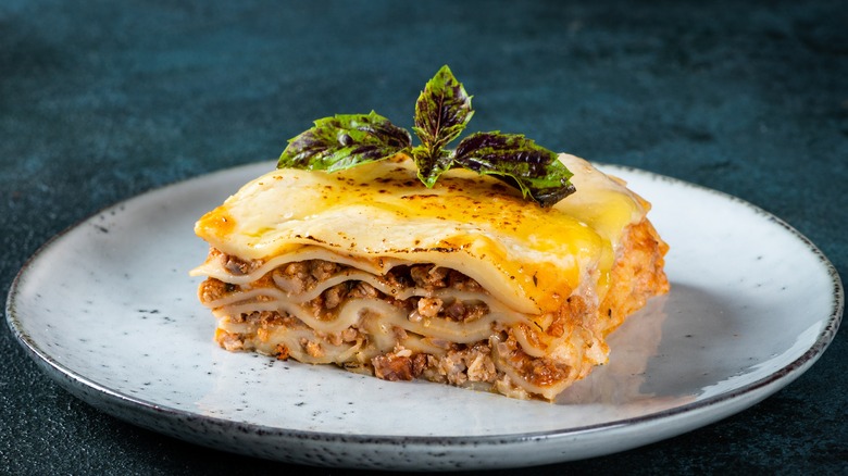 Lasagna with basil leaves 