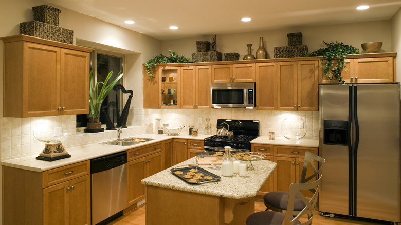 kitchen with decor above kitchen cabinets
