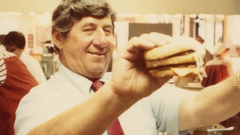 Jim Delligatti holding Big Mac