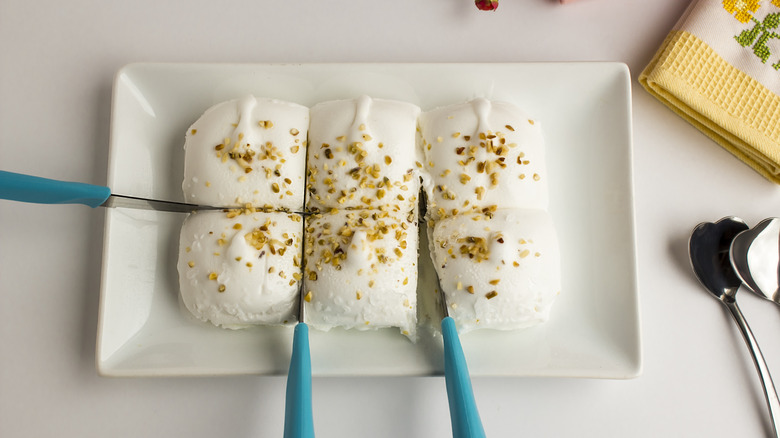 knife slicing through ice cream