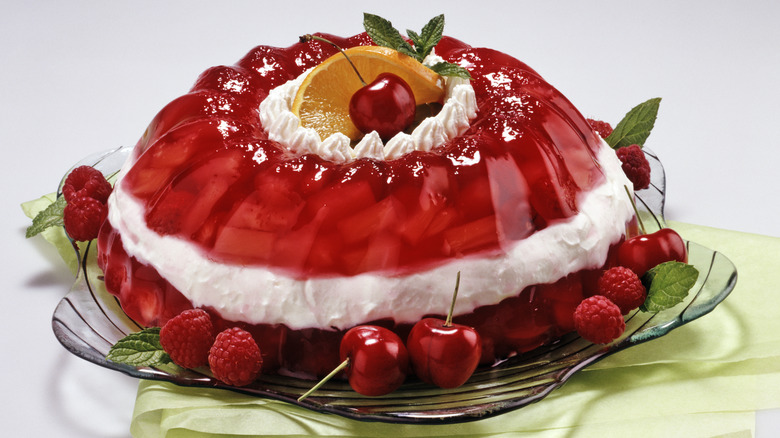 Red Jell-o dessert on glass platter