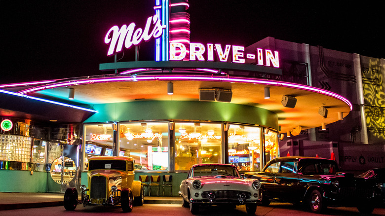 Antique cars are parked outside of Mel's Drive-In in San Francisco.