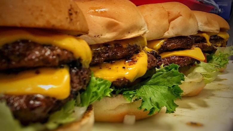 A line of Bubba's Texas Burger Shack cheeseburgers