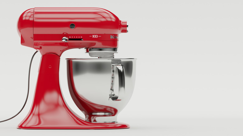 A red KitchenAid stand mixer.