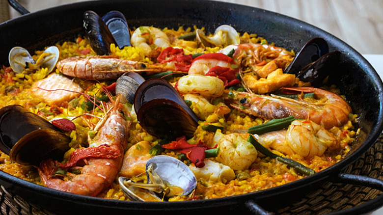 A large skillet of seafood paella