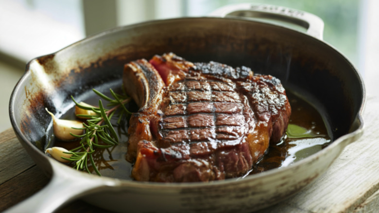 Finished cowboy ribeye in pan