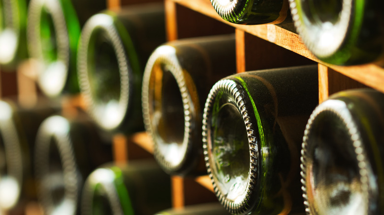 Rack of wine bottles showing bottom indent or punt