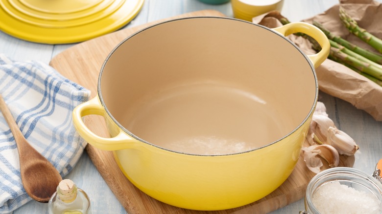 Clean interior of dutch oven