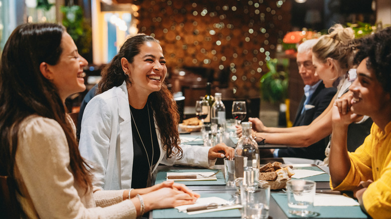Friends dining at a restaurant.
