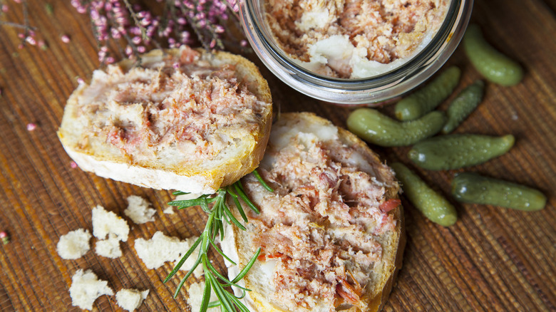 Rillettes spread on bread and cornichons