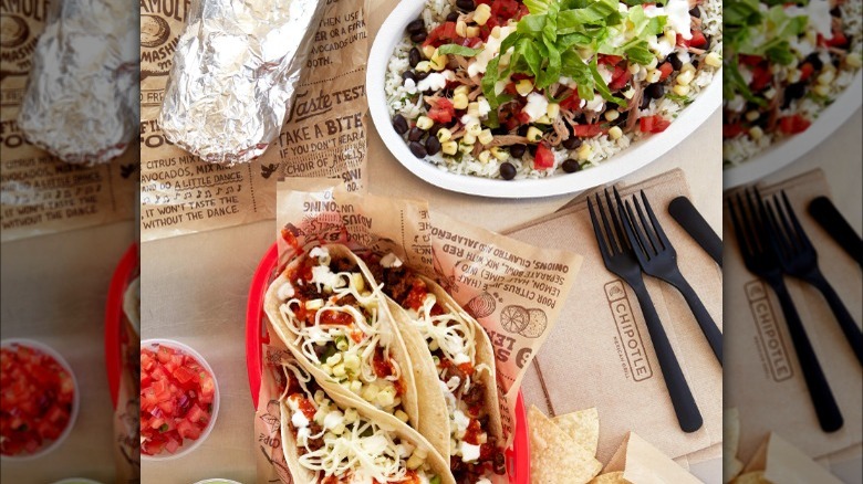 Shredded beef barbacoa burrito in flour tortilla